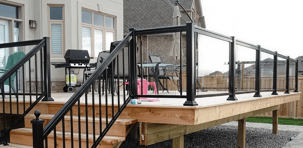 Handrail installation on a deck staircase for safety and code compliance in Provo, UT